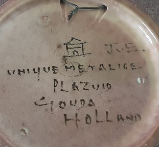 Gouda pottery bird plate mark mark